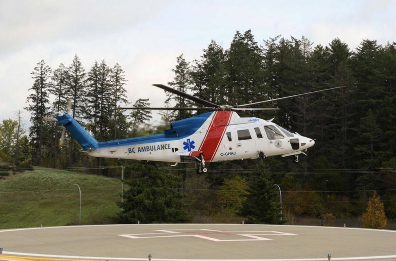 An image of a helicopter transferring a patient
